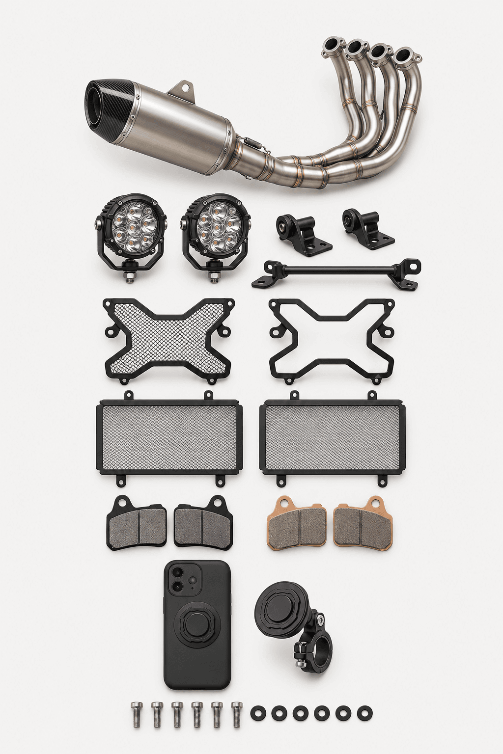 Flat lay of motorcycle parts: titanium exhaust system, LED auxiliary lights, radiator guards, brake pads and a phone mount